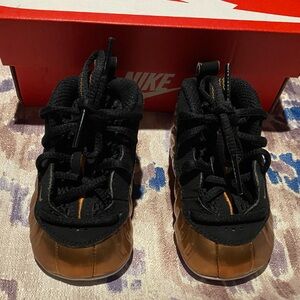 Nike Kids Black and Gold Shoes
